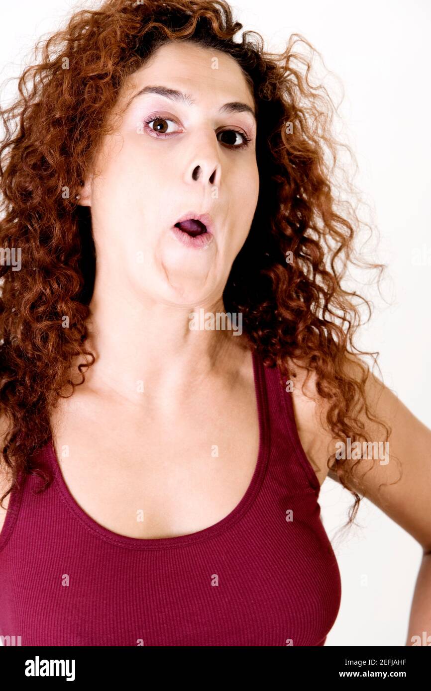 Portrait of a young woman making a face Banque D'Images