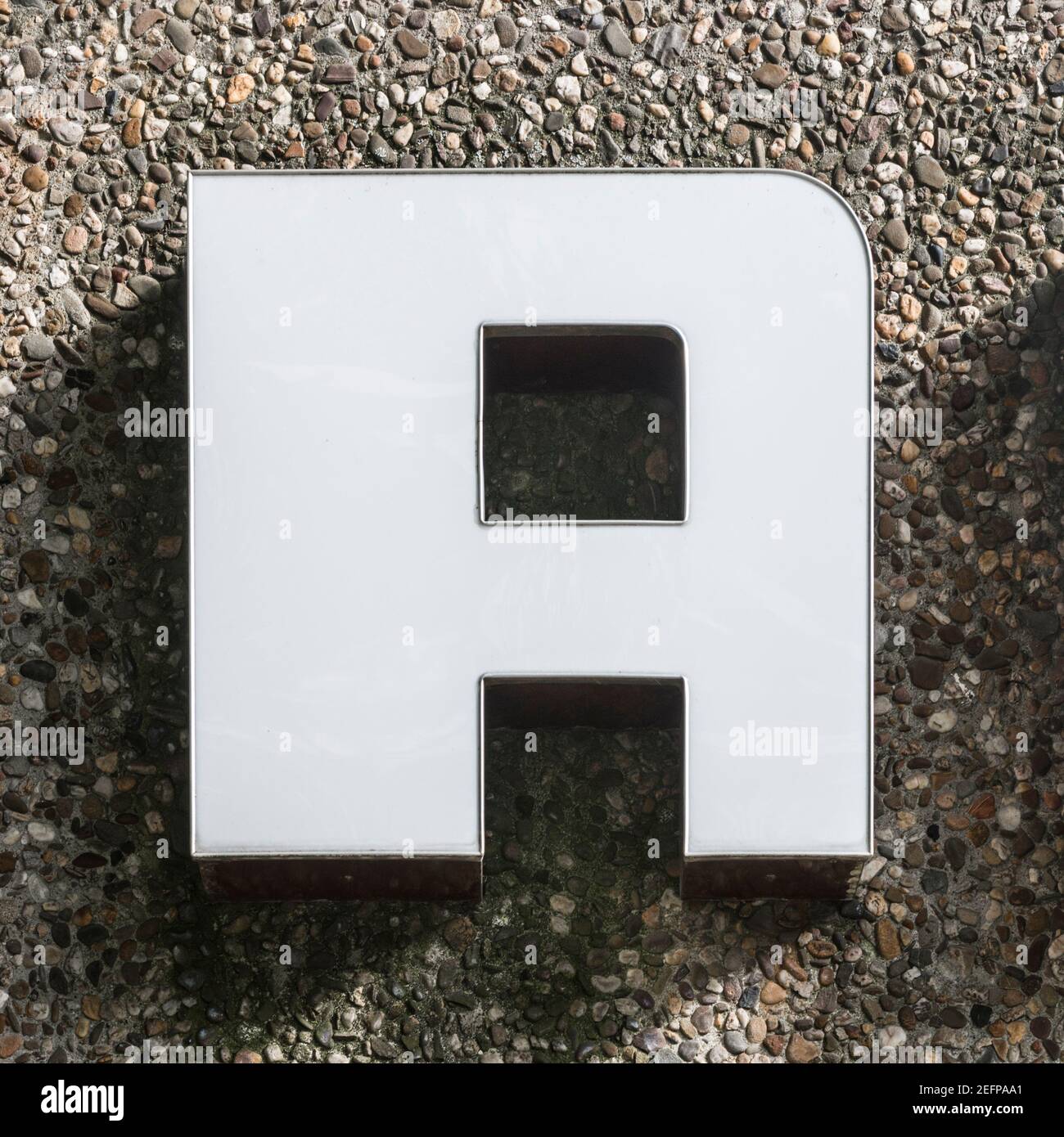 Lettre BLANCHE A des années 70 sur un mur en béton Banque D'Images