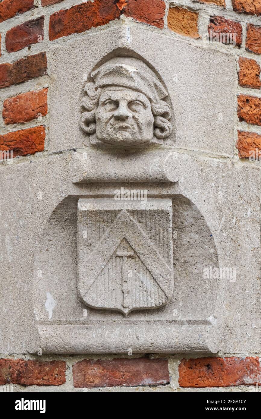 Décoration en pierre sur un bâtiment historique à Bruges, Belgique Banque D'Images