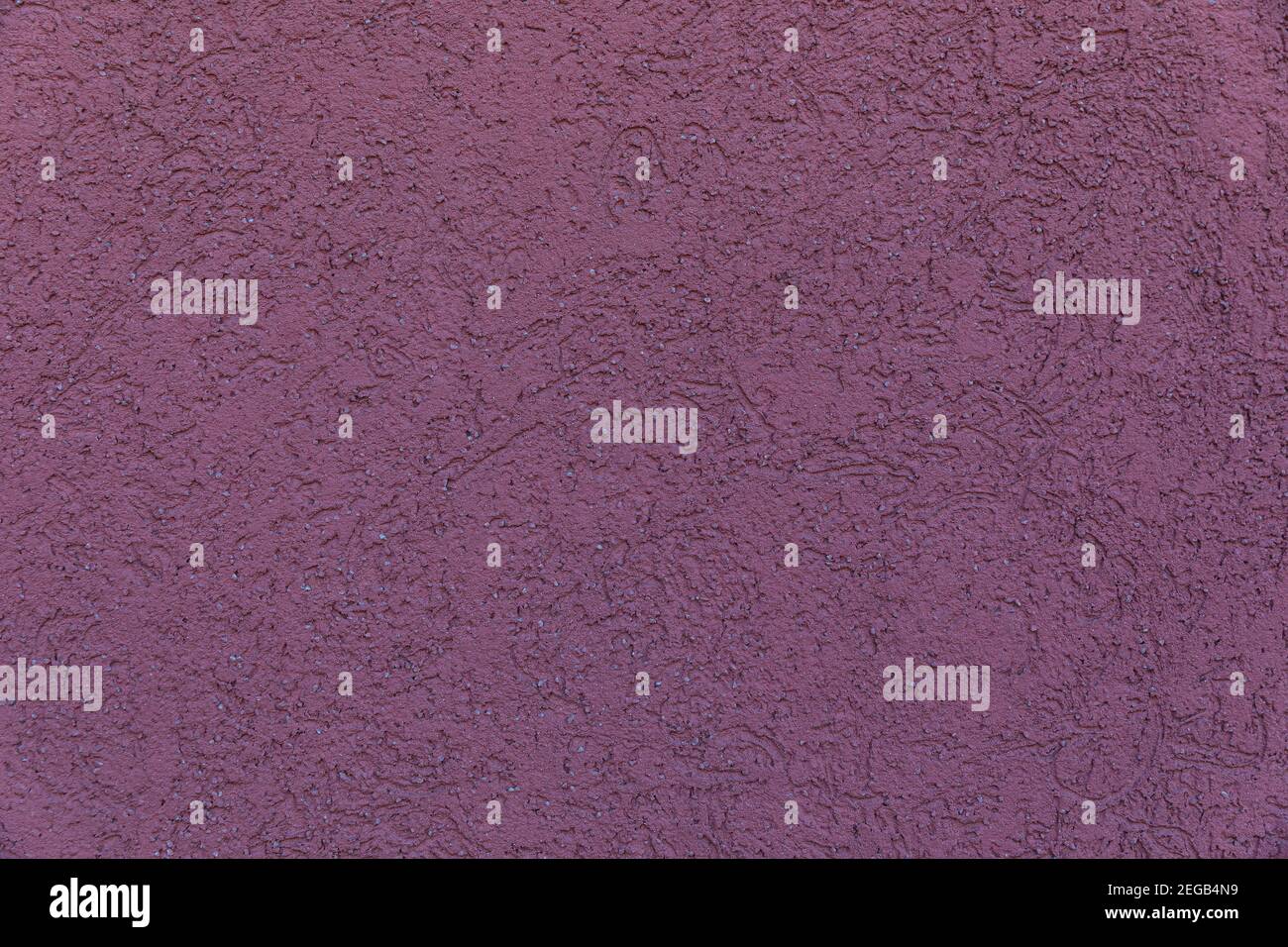 La texture du mur est de couleur mauve foncé Banque D'Images