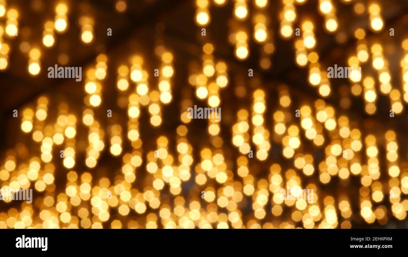 Lampes électriques anciennes et fashiées défocacées qui illuminent la nuit. Résumé gros plan de flou rétro casino décoration chatoyante, Las Vegas Etats-Unis. Allumé vi Banque D'Images