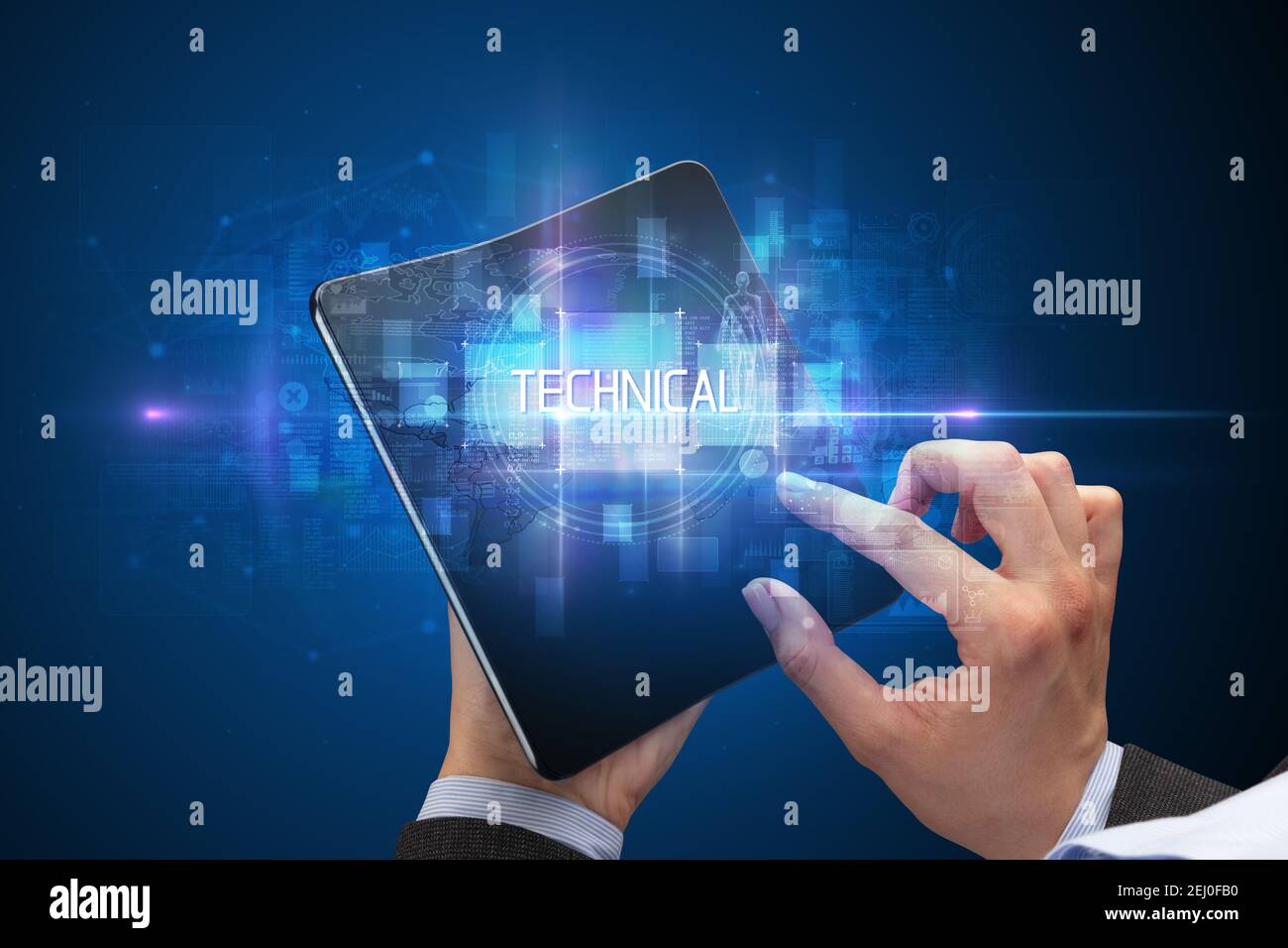 Businessman holding a smartphone pliable avec inscription technique, nouvelle technologie concept Banque D'Images