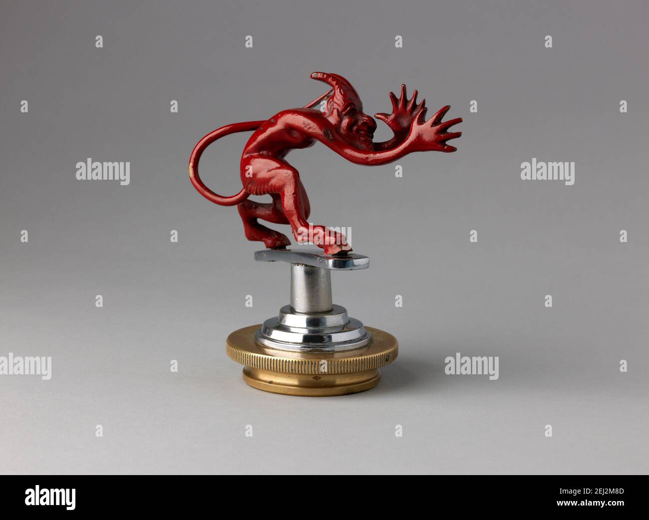 VÊTEMENTS DUNHILL POUR LES AUTOMOBILISTES , MASCOTTE DIABLE RUDE.VINTAGE TWENIE DIABLE Banque D'Images