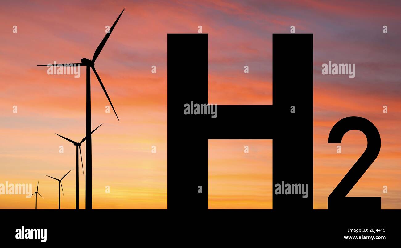 Silhouettes de symbole hydrogène et éoliennes. Obtenir de l'hydrogène vert à partir de sources d'énergie renouvelables Banque D'Images