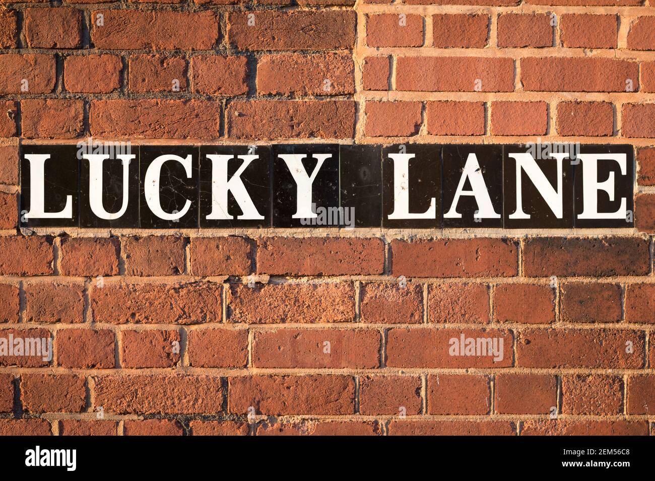 Porte-nom de rue Lucky Lane, Exeter, Devon, Royaume-Uni. Banque D'Images