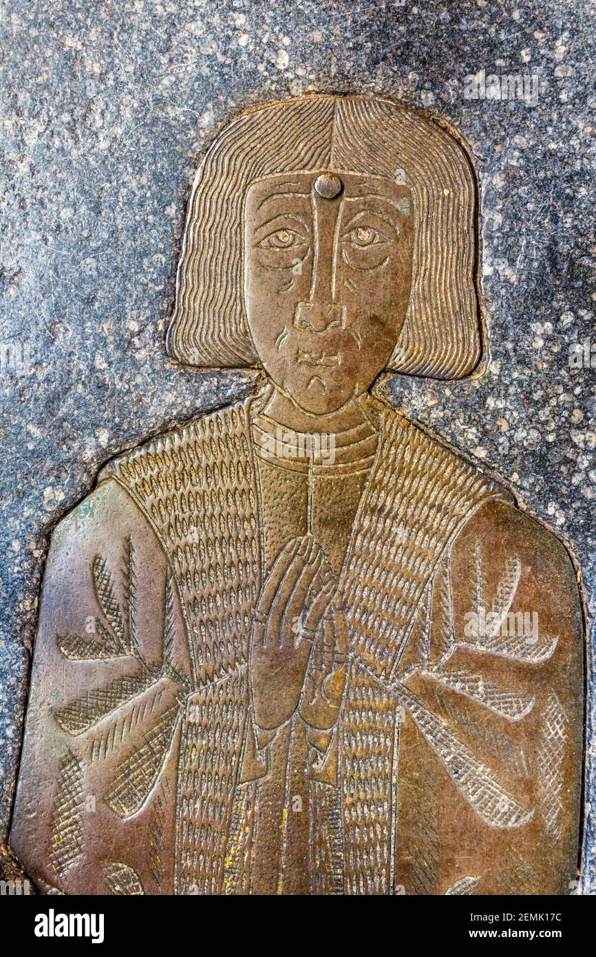 Un détail de l'airain commémoratif du marchand de laine Thomas Buche (c. 1525) dans l'église de la ville de Northleach dans les Cotswolds, Gloucestershire UK. Banque D'Images