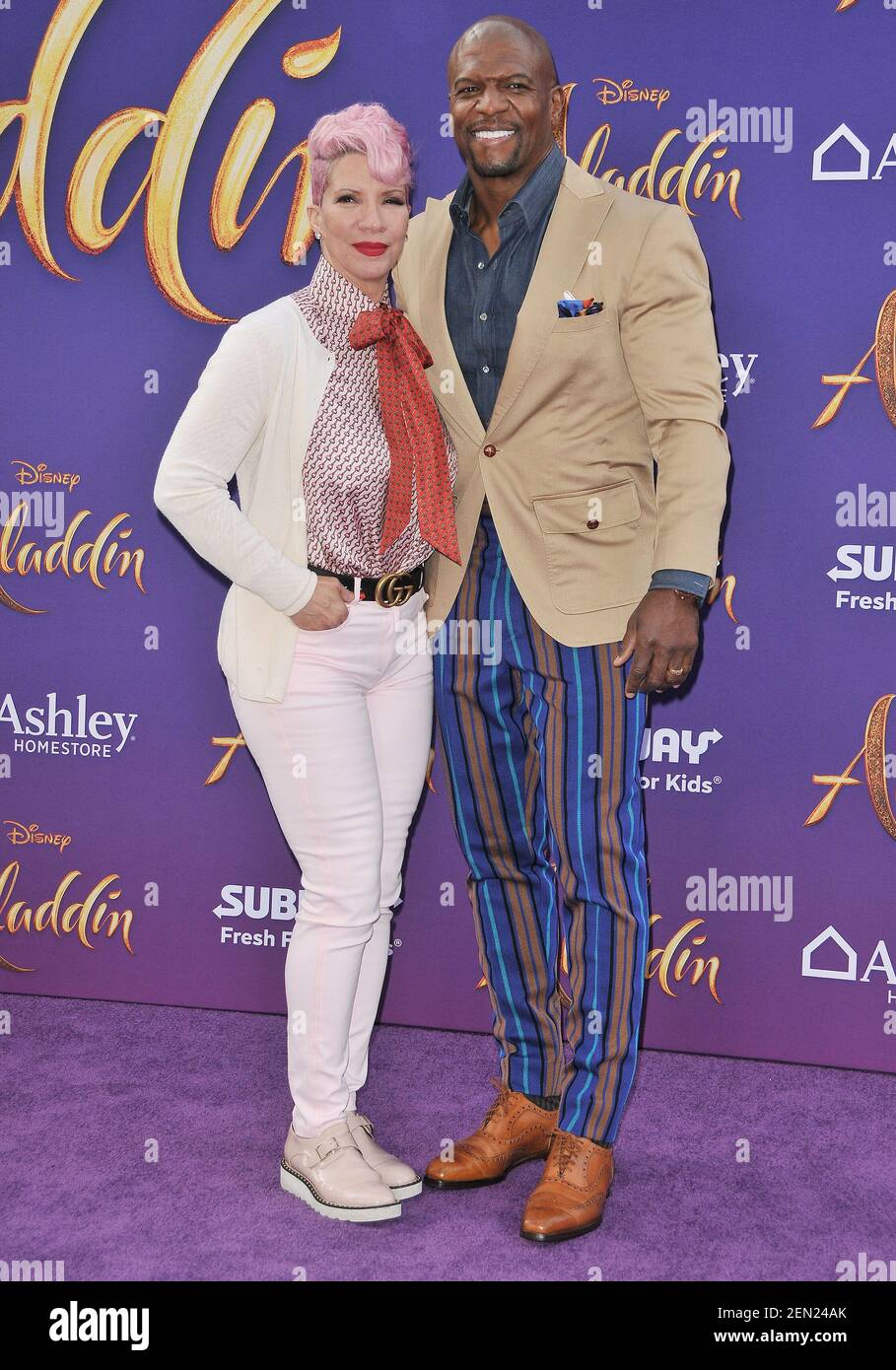 (G-D) Rebecca Crews et Terry Crews à la première Disney 'Aladdin' Los Angeles qui s'est tenue au théâtre El Capitan à Hollywood, CA, le mardi 21 mai 2019. (Photo de la Sathanlee B. Mirador/Sipa USA) Banque D'Images