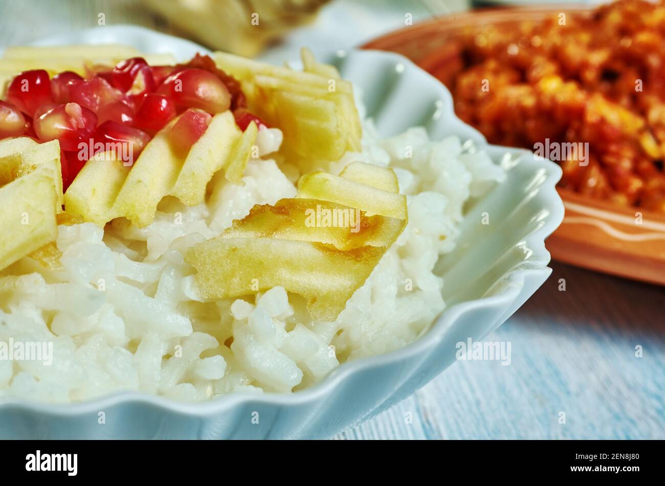Risotto Alle mele - risotto aux pommes, plat populaire de riz italien Banque D'Images