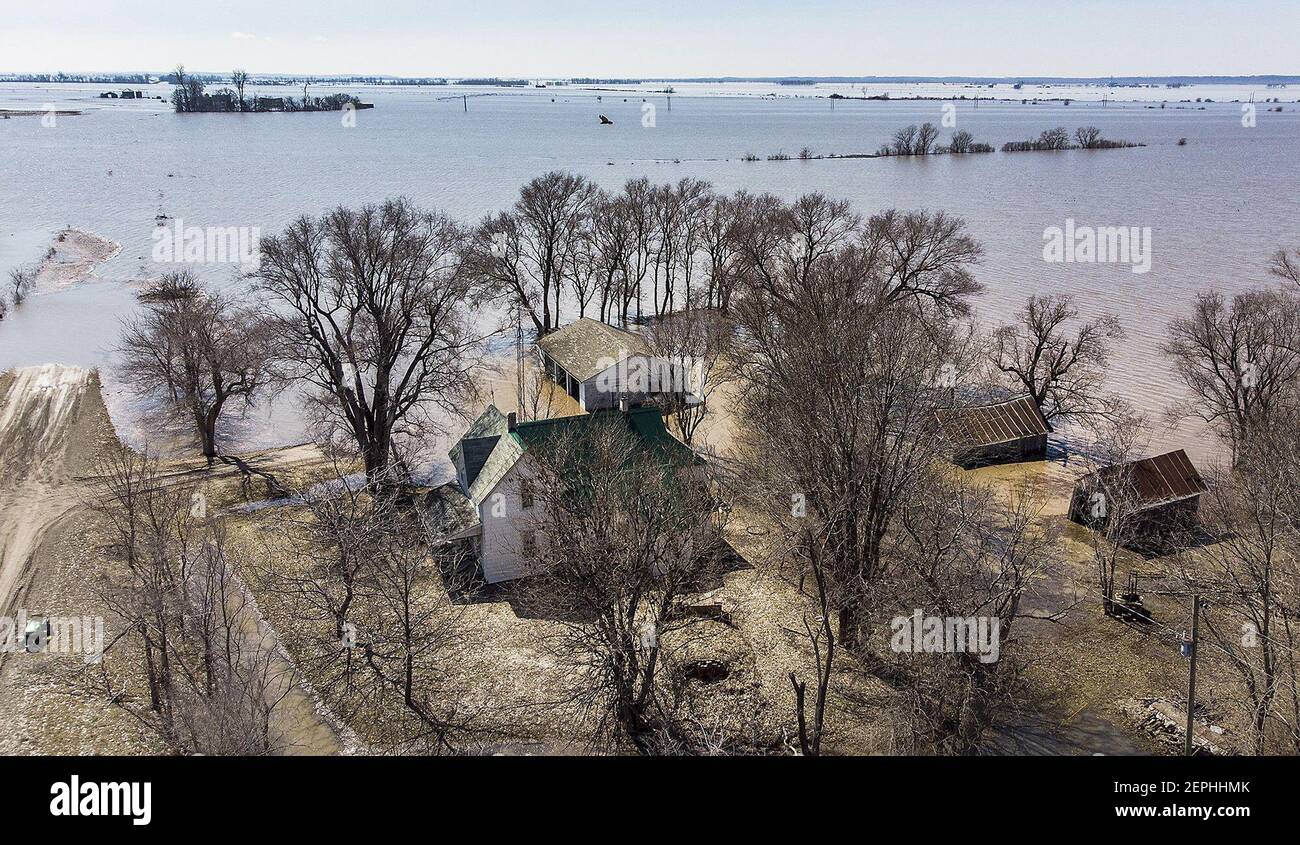 Les eaux d'inondation ont entouré une maison près de Craig, Missouri, le 21 mars 2019, après la rupture d'un lévee. (Tammy Ljungblad/Kansas City Star/TNS) Banque D'Images
