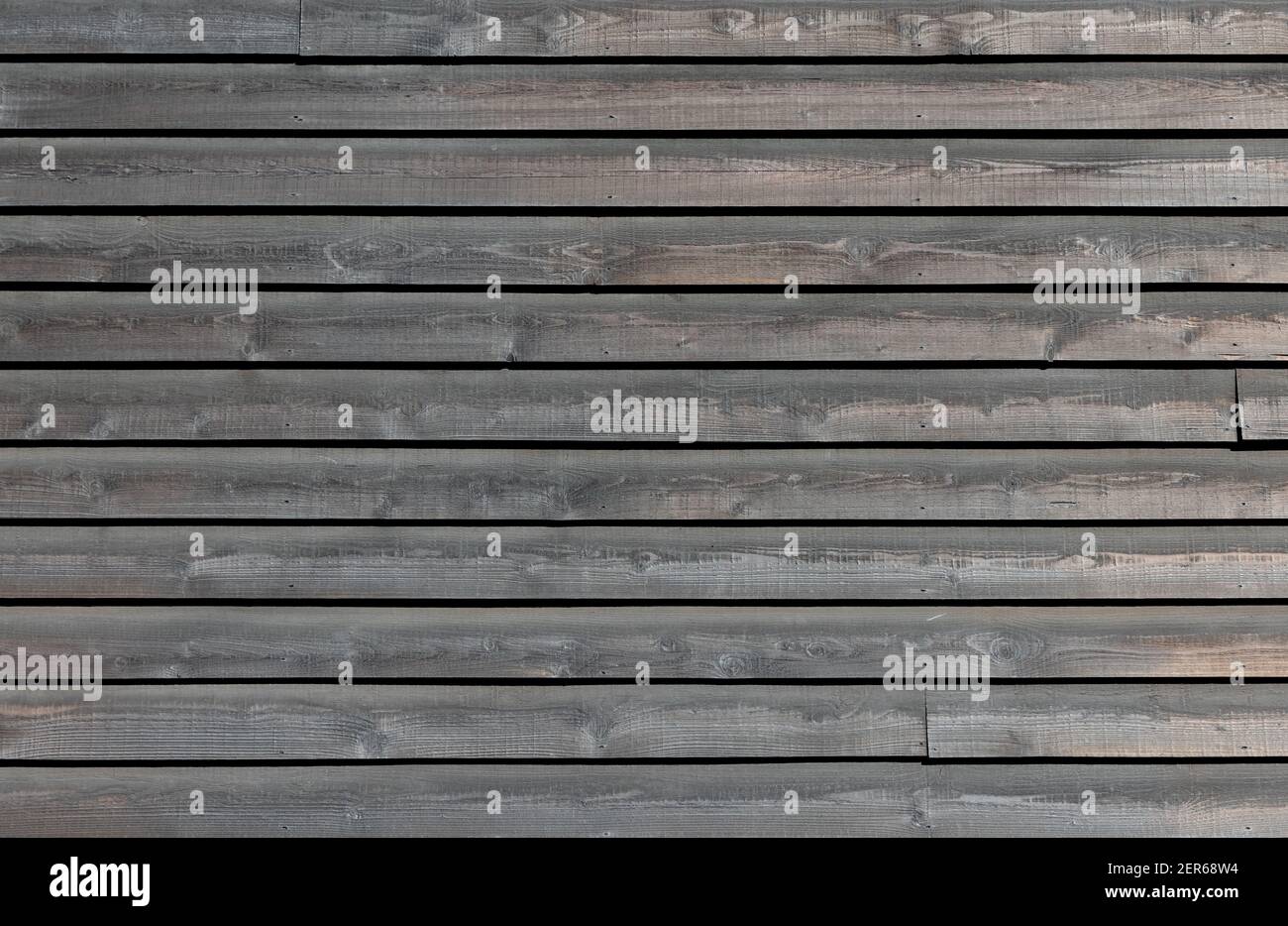 Revêtement en bois peint sur le côté d'un bâtiment. Texture d'arrière-plan. ROYAUME-UNI Banque D'Images