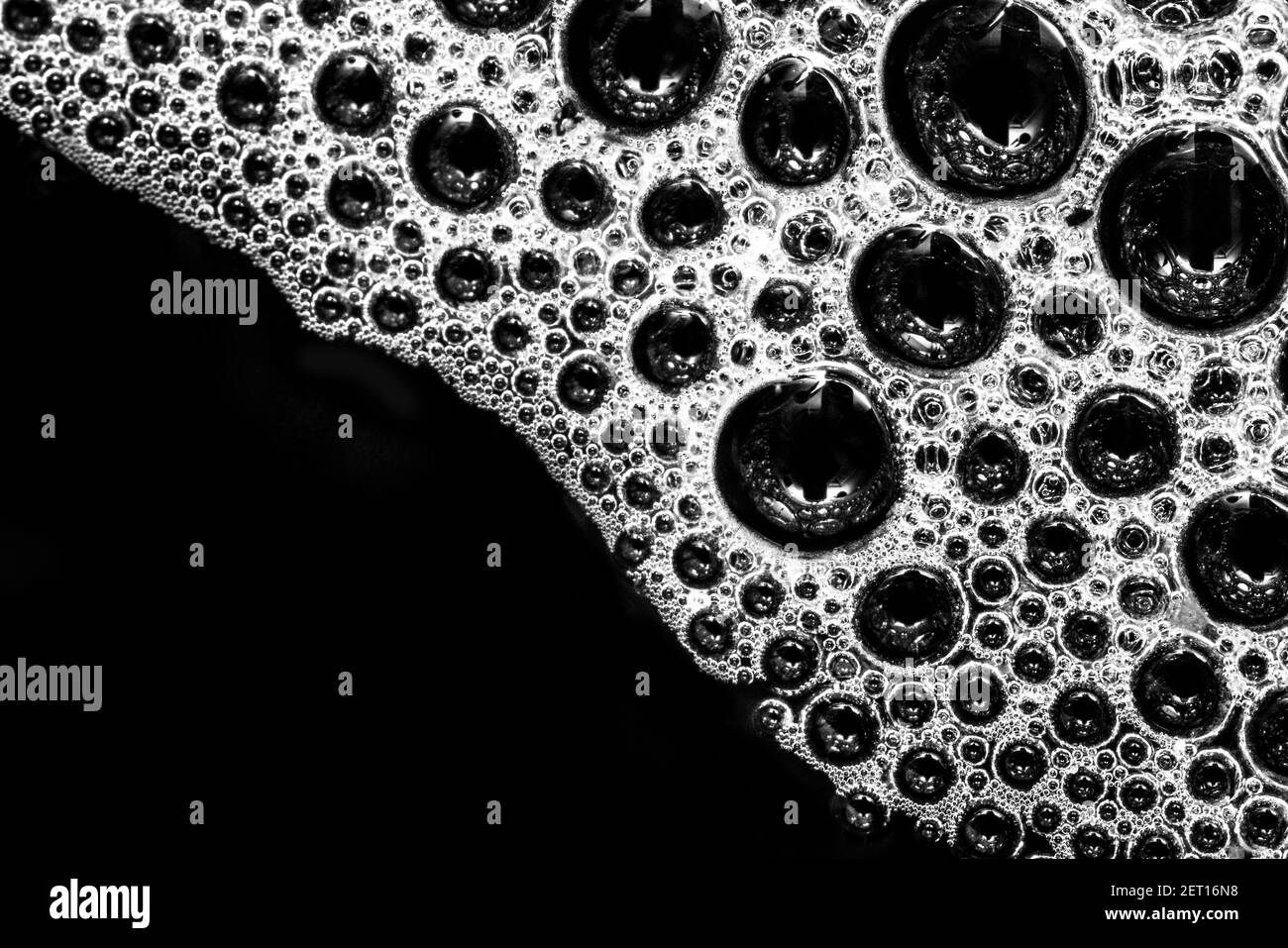 Macro-photographie extrêmement rapprochée des bulles d'eau et des liquides Banque D'Images