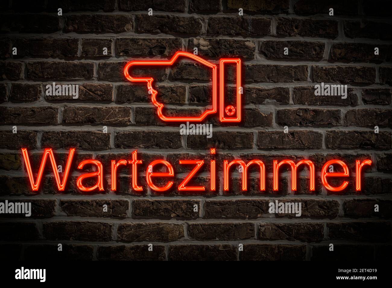Photo détaillée d'un panneau néon sur un mur avec L'inscription Wartezimmer (salle d'attente) Banque D'Images