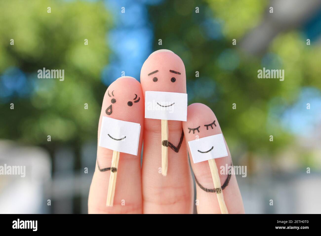 L'art des doigts de la famille. Concept de personnes cachant des émotions. Banque D'Images
