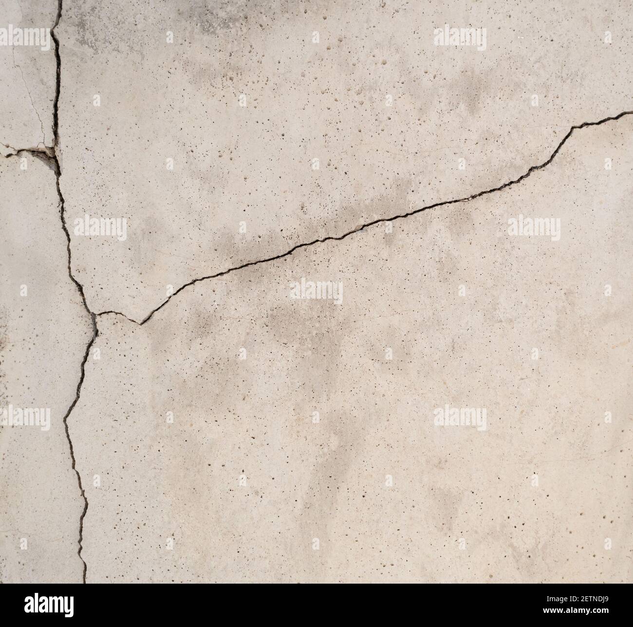 Fissurer la texture du ciment d'un fond de mur brisé Banque D'Images