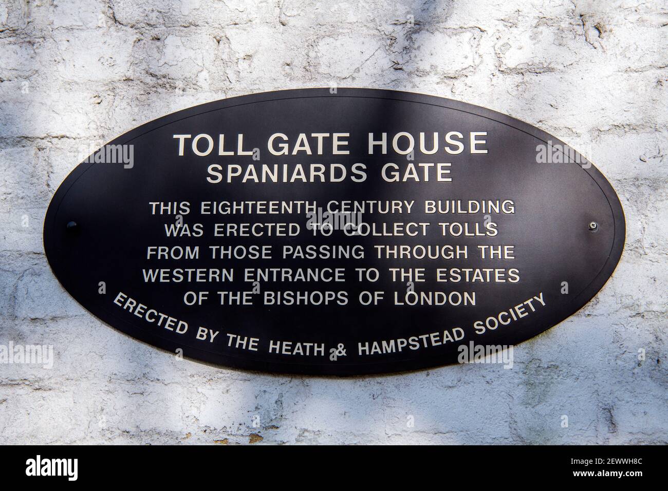 Plaque sur le mur de la maison de péage du XVIIIe siècle en espagnol Porte Hampstead Londres Banque D'Images