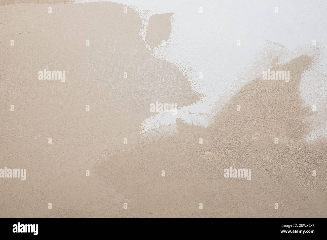Ciment blanc beige texture pierre béton, pierre plâtré mur de stuc. Peint plat fondu pastel background.decorative plâtre de soulagement sur le mur closeup Banque D'Images