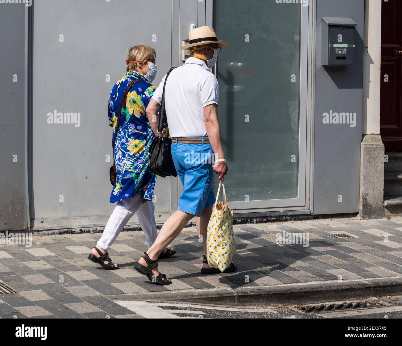 Sneakers LV archlight Louis Vuitton collection 2020. Woman with Louis  Vuitton sneakers walking in the street of Brussels - Belgium- Europe Stock  Photo - Alamy