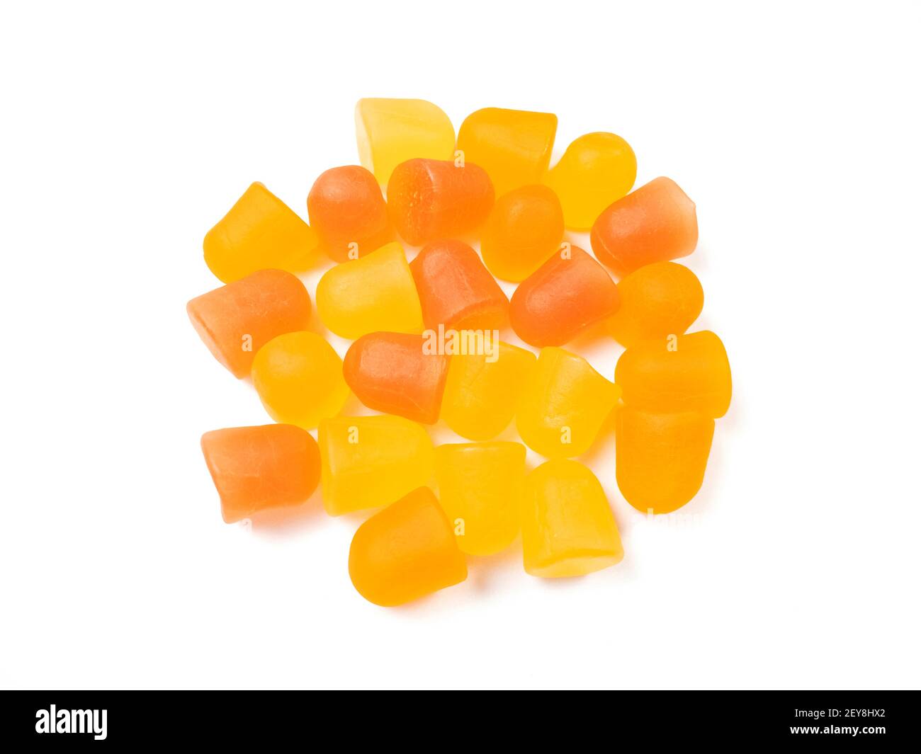 Gros plan de la texture des gommies multivitaminées orange et jaune. Concept de mode de vie sain. Banque D'Images