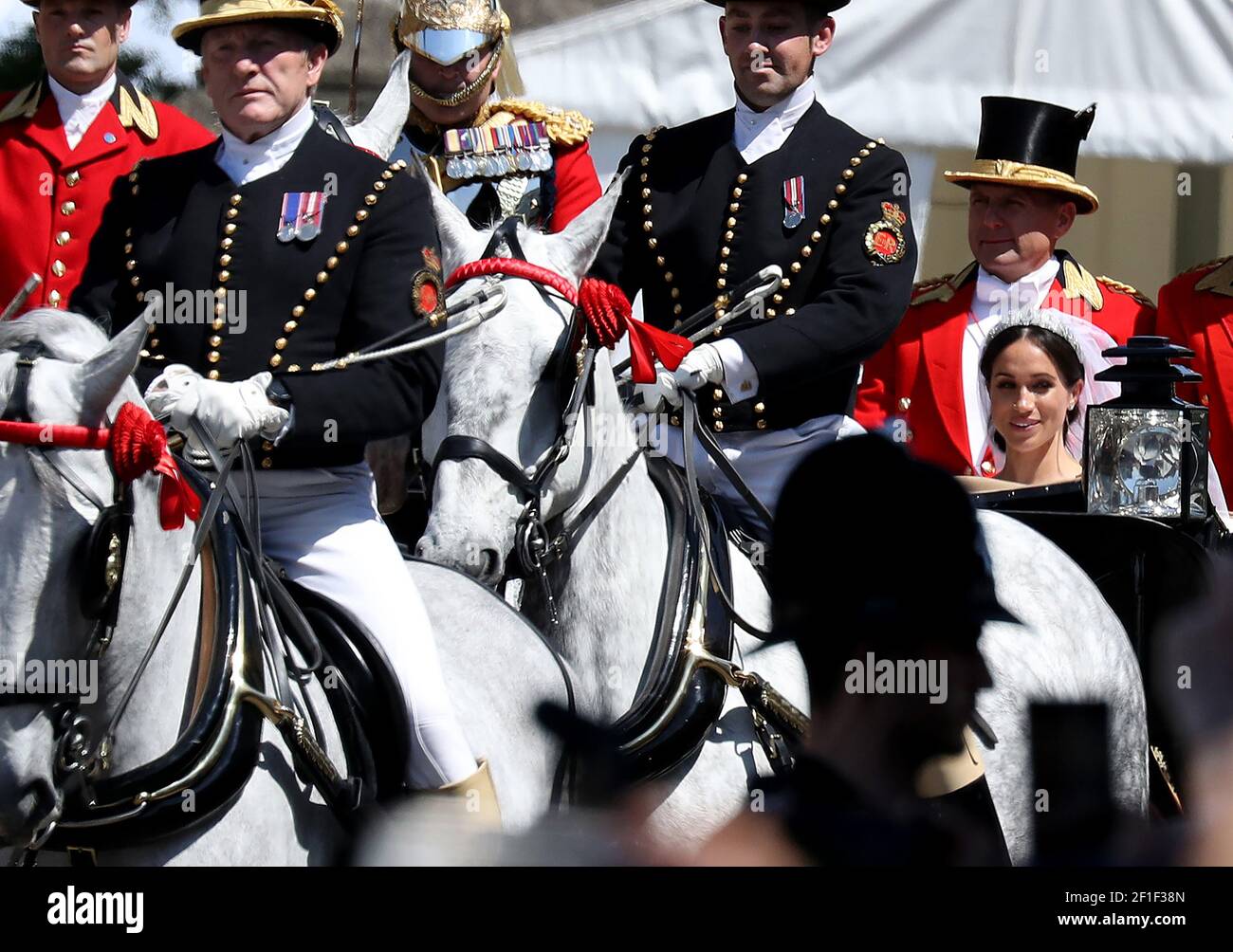 Le prince Harry de Grande-Bretagne et sa nouvelle femme Meghan quittent le château de Windsor, en Grande-Bretagne, le 19 mai 2018. Banque D'Images