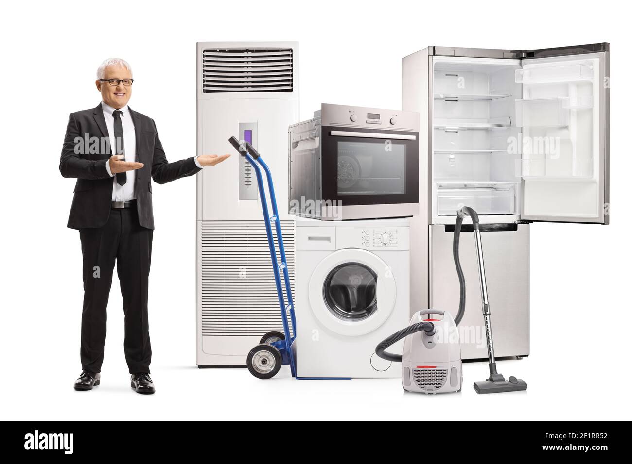 Portrait complet d'un homme d'affaires mature montrant une maison électrique appareils isolés sur fond blanc Banque D'Images