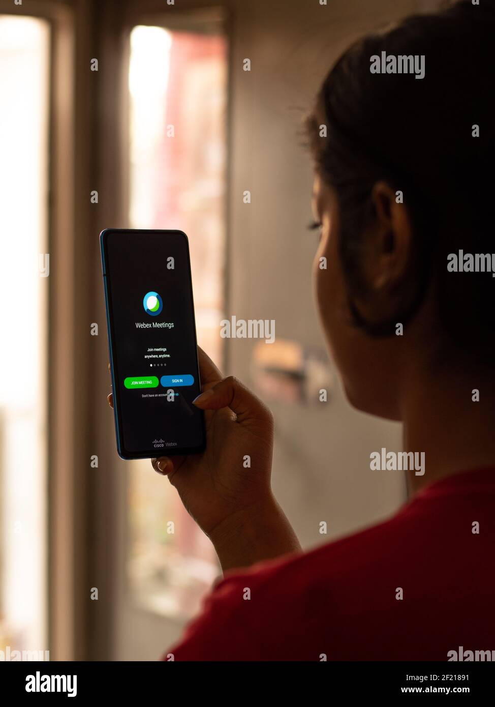 Assam, inde - 10 mars 2021 : logo Webex Meetings sur image de stock d'écran de téléphone. Banque D'Images