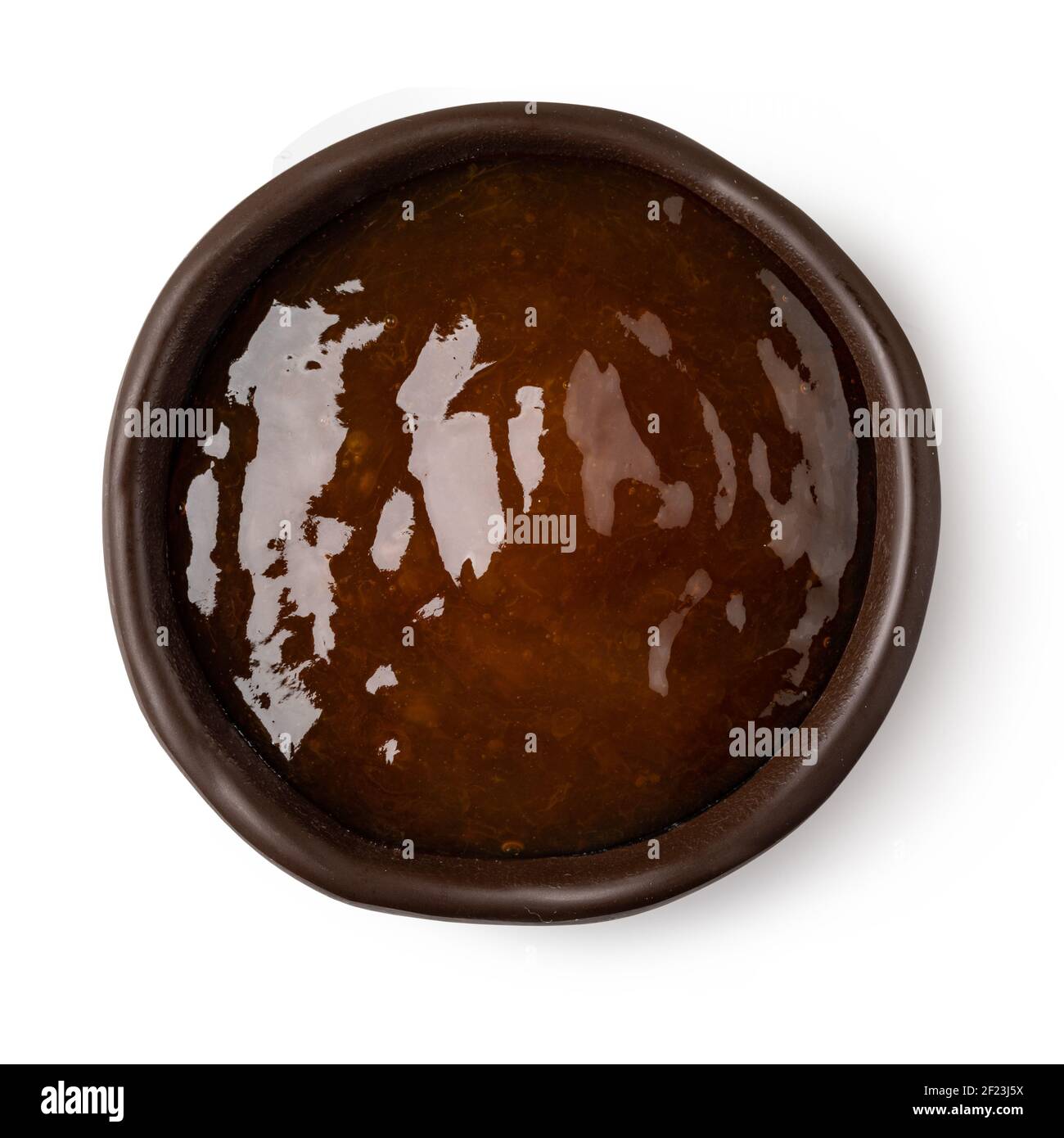 Bol en verre de confiture d'abricot Banque D'Images