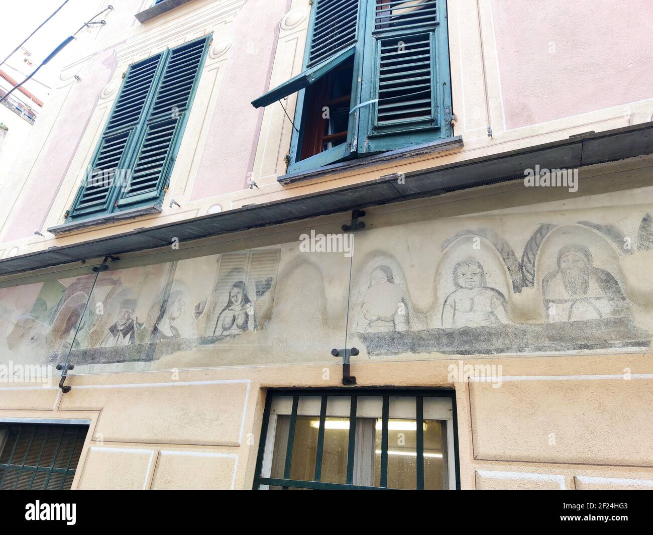 Les grottes de Levanto liguria village Italie vieux 1500s peintures sur la construction caricatures des clients réguliers de l'auberge Banque D'Images