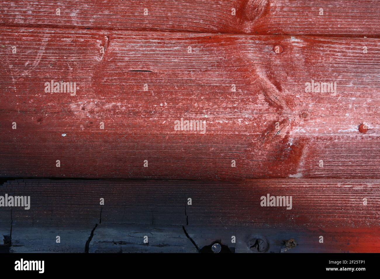 Gros plan en bois rouge brûlé Banque D'Images