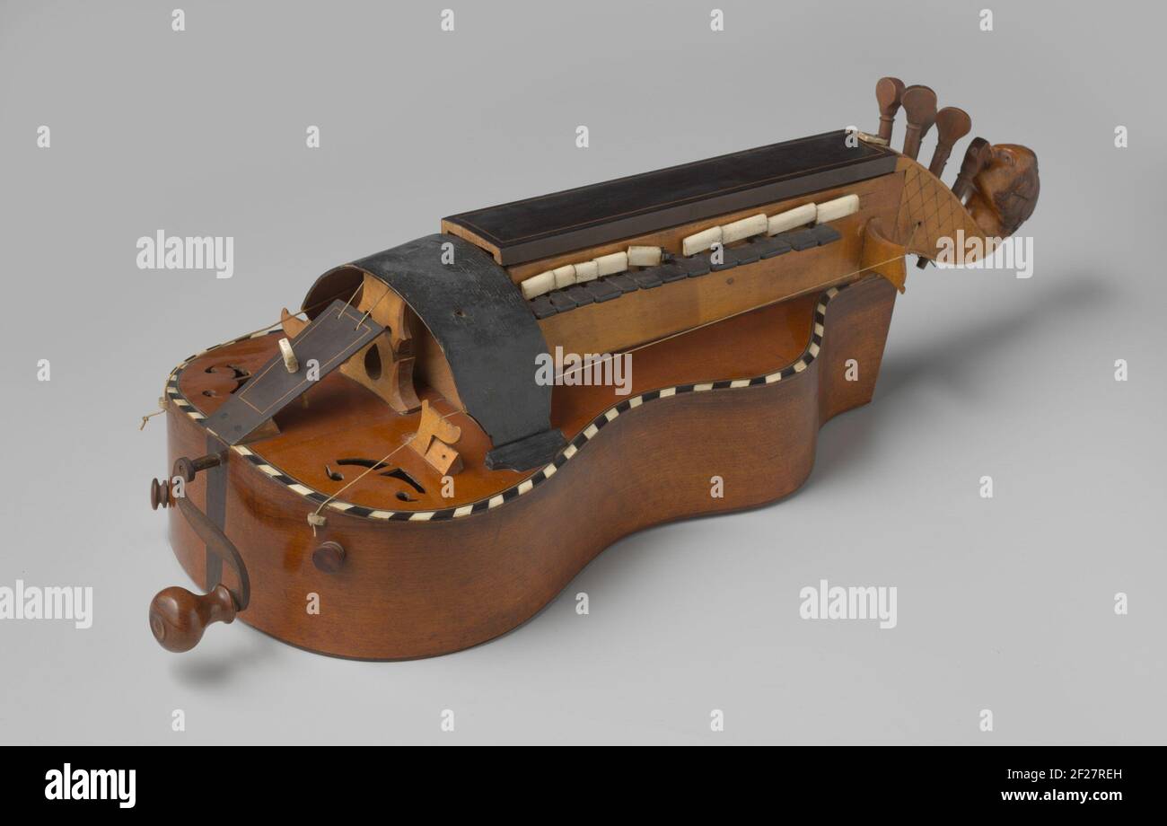 Hurdy-Gurdy.Crakeer avec six cordes, dix ivoire et treize touches ébène. Deux pièces séparées dans un sac séparé. Banque D'Images