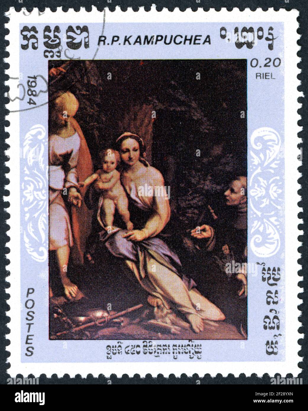 KAMPUCHEA - VERS 1984: Un timbre imprimé à Kampuchea, montré les détails de peintures: Repos sur vol en Egypte, par Antonio da Correggio, vers 1984 Banque D'Images