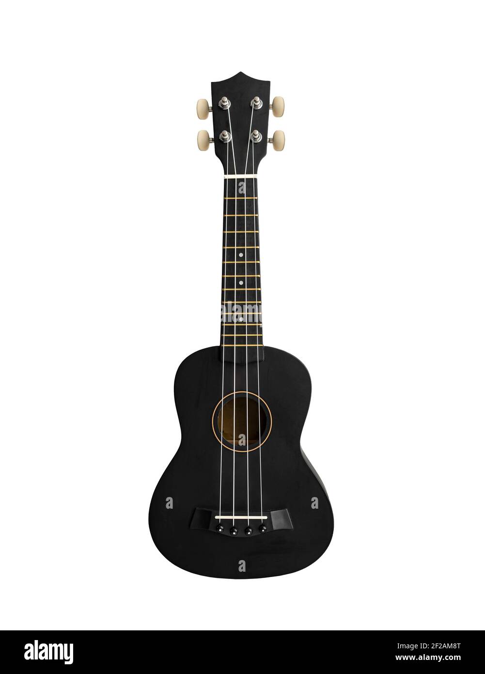 Un classique concert noir ukulele est isolé sur fond blanc. Guitare hawaïenne Banque D'Images