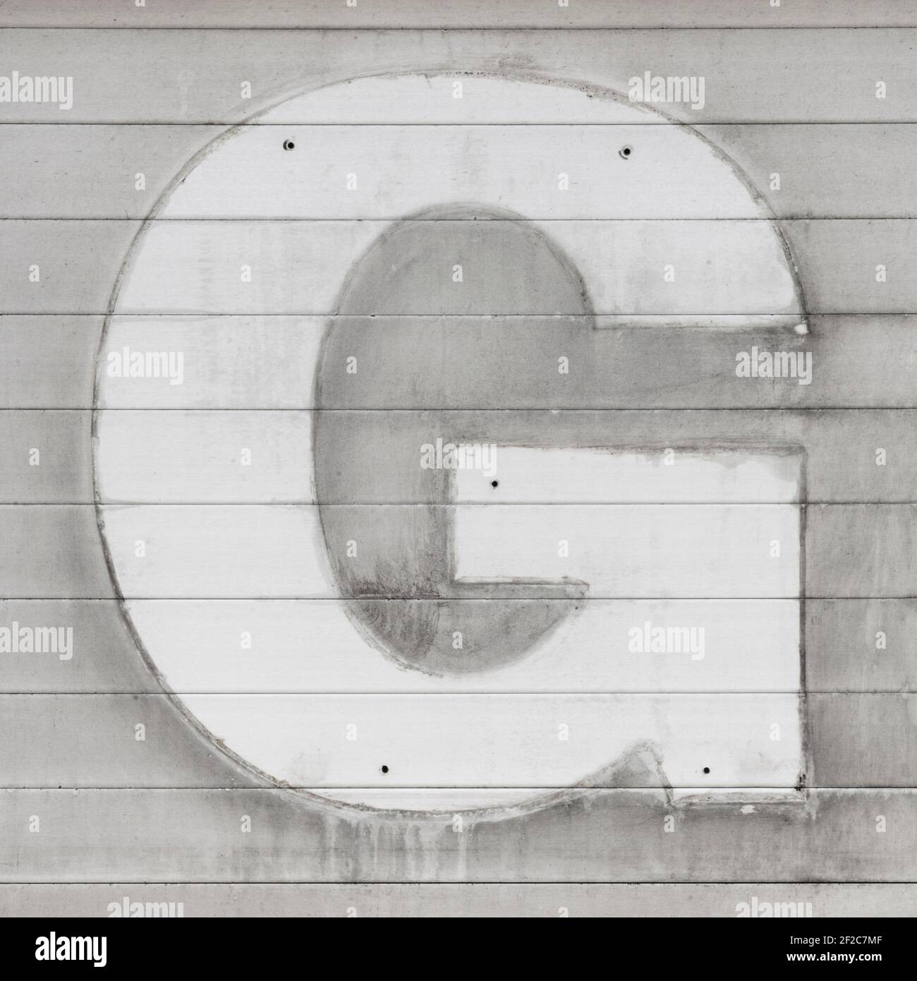 Reste d'une lettre G perdue Banque D'Images