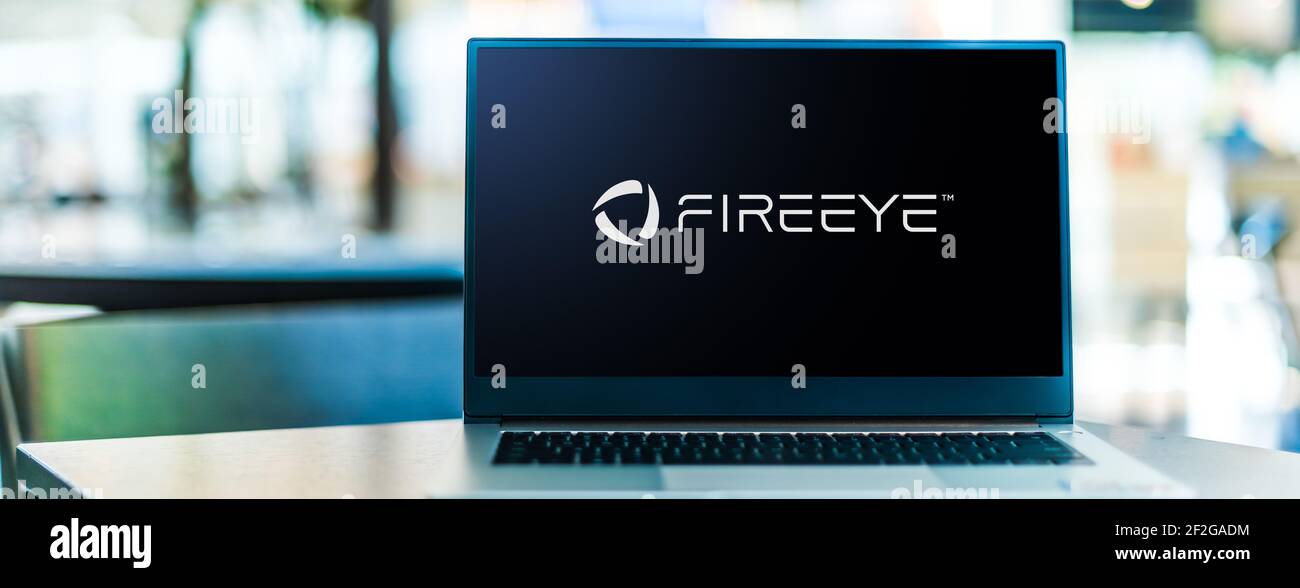 POZNAN, POL - 6 FÉVRIER 2021 : ordinateur portable affichant le logo de FireEye, une société de cybersécurité cotée en bourse dont le siège social est à Milpitas, en Californie Banque D'Images