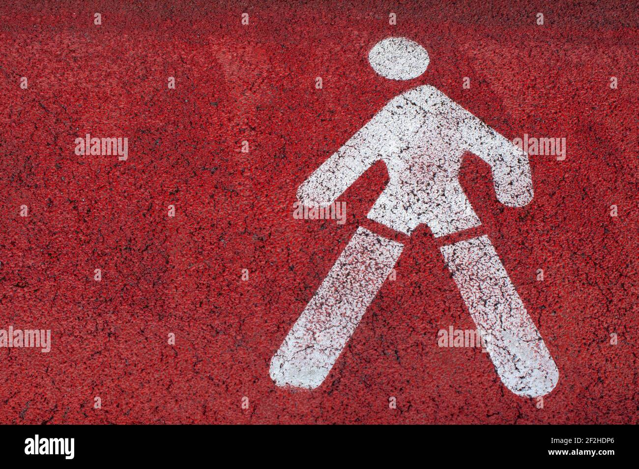 Italie, Lombardie, allée piétonne panneau sur le sol d'asphalte Banque D'Images