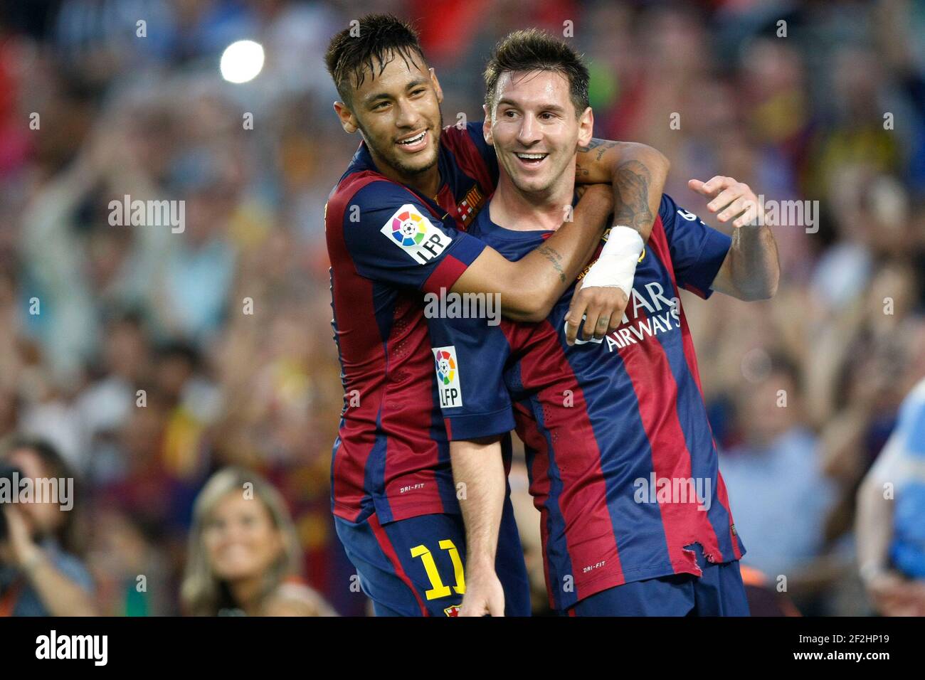 Leo Messi et Neymar de Barcelone célèbrent leur but lors du championnat  d'Espagne du match de football de la Ligue entre le FC Barcelone et Grenade  le 27 septembre 2014 au stade