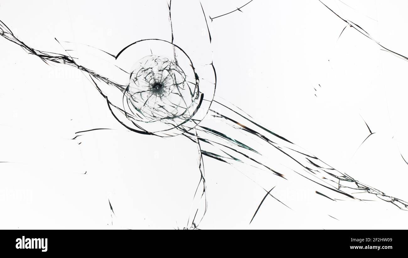 Fissures sur le verre sur fond blanc. Banque D'Images