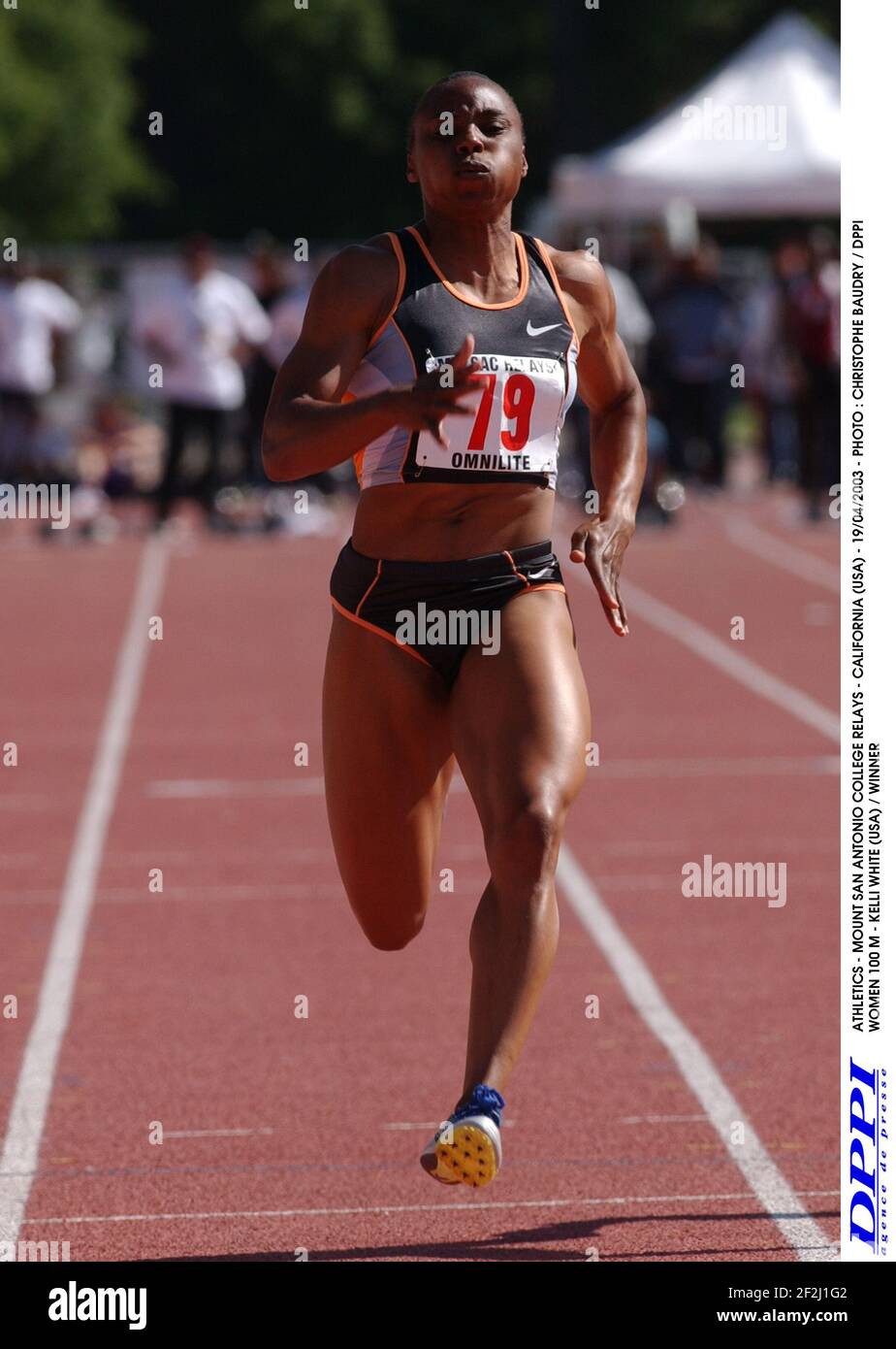 ATHLETICS - MOUNT SAN ANTONIO COLLEGE RELAY - CALIFORNIE (ETATS-UNIS) - 19/04/2003 - PHOTO : CHRISTOPHE BAUDRY / DPPI FEMMES 100 M - KELLI WHITE (ETATS-UNIS) / GAGNANT Banque D'Images