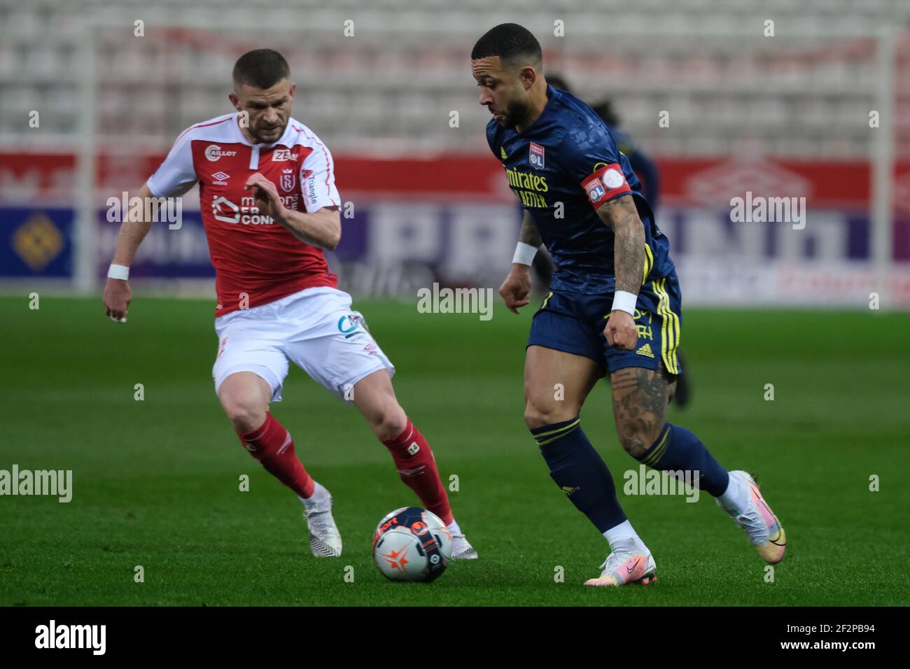 Reims, Marne, France. 12 mars 2021. L'attaquant de Lyon MEMPHIS DEPAY en action pendant le championnat de France de football Ligue 1 Uber mange le Stade de Reims contre l'Olympique Lyonnais au stade Auguste Delaune - Reims.jeu 1:1 crédit: Pierre Stevenin/ZUMA Wire/Alamy Live News Banque D'Images
