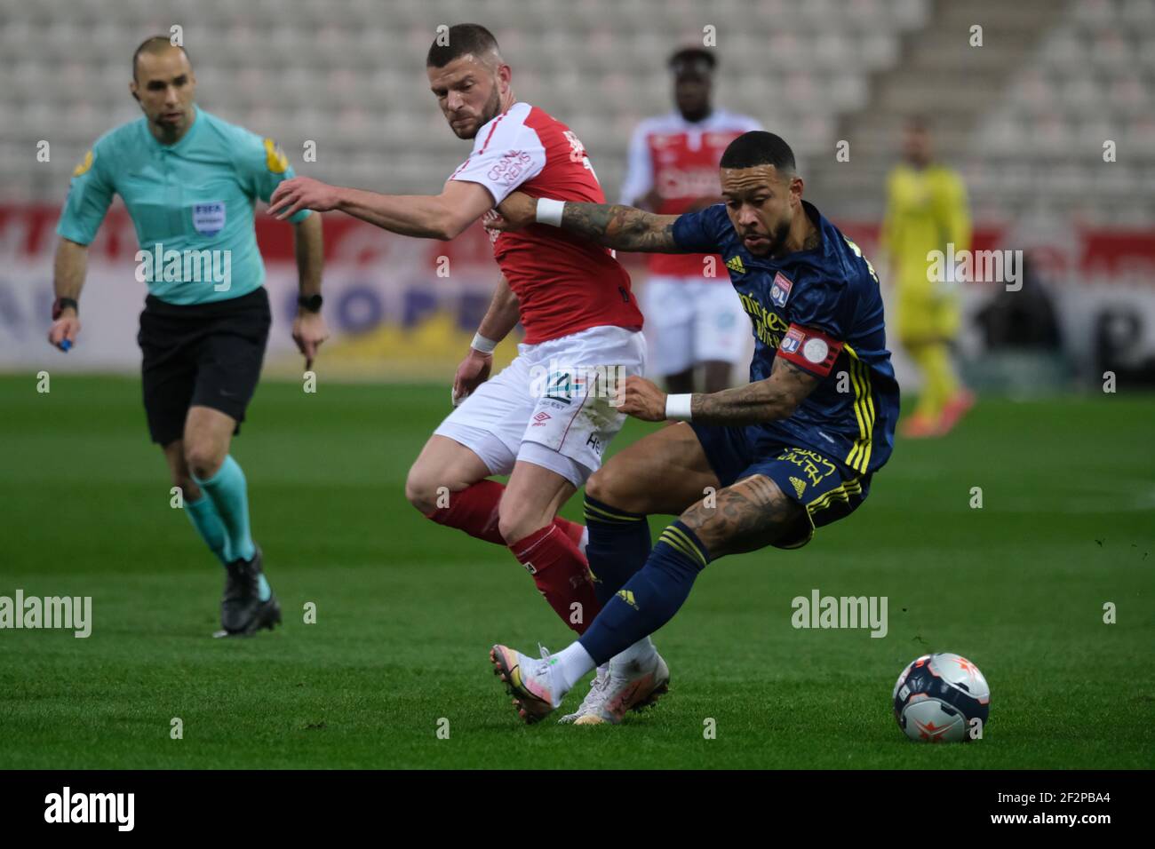 Reims, Marne, France. 12 mars 2021. L'attaquant de Lyon MEMPHIS DEPAY en action pendant le championnat de France de football Ligue 1 Uber mange le Stade de Reims contre l'Olympique Lyonnais au stade Auguste Delaune - Reims.jeu 1:1 crédit: Pierre Stevenin/ZUMA Wire/Alamy Live News Banque D'Images