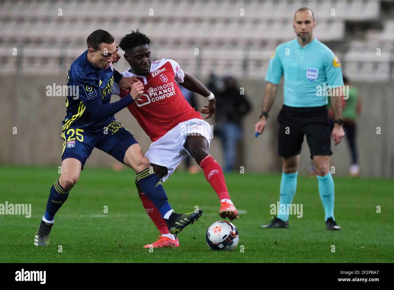 Reims, Marne, France. 12 mars 2021. Milieu de terrain DE Reims MARSHALL MUNETSI en action pendant le championnat français de football Ligue 1 Uber mange le Stade de Reims contre l'Olympique Lyonnais au stade Auguste Delaune - Reims.jeu 1:1 crédit: Pierre Stevenin/ZUMA Wire/Alamy Live News Banque D'Images
