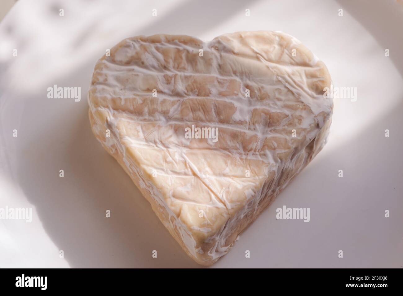 Brie, en forme de coeur Banque D'Images