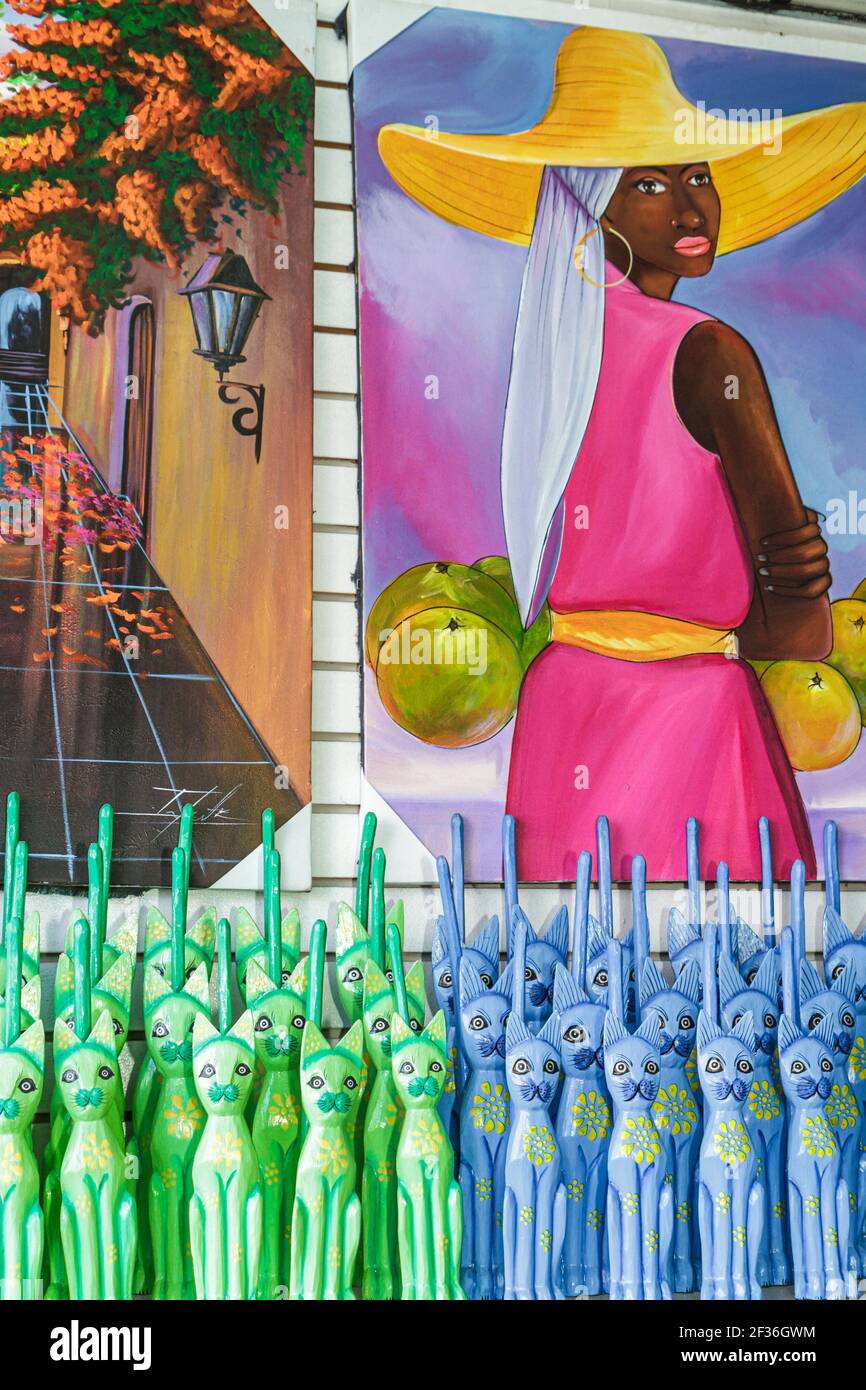 Santo Domingo République dominicaine,Ciudad Colonia Zona Colonial,Mercado modelA boutique de souvenirs du marché,peintures haïtiennes figurines chats sculptés en bois,d Banque D'Images