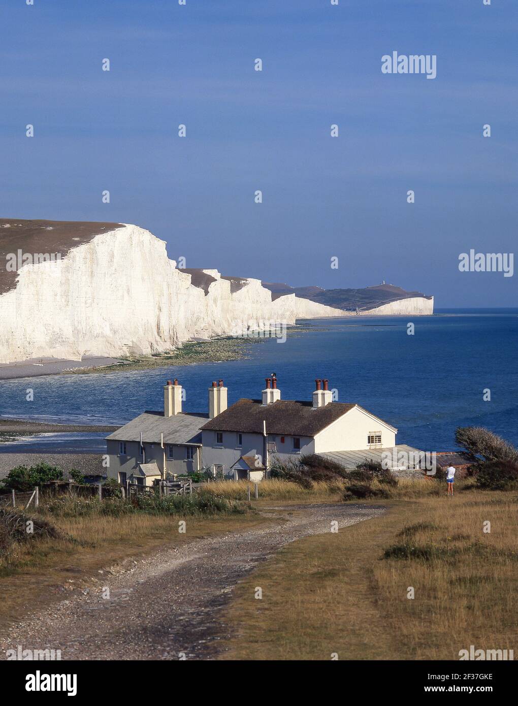 Sept Sœurs de falaises et de cottages, garde-côtes Cuckmere Haven, Seaford Head Nature Reserve, Jalhay, East Sussex, Angleterre, Royaume-Uni Banque D'Images