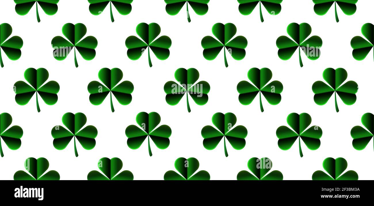 Motif sans couture Shamrock sur fond blanc. Banque D'Images