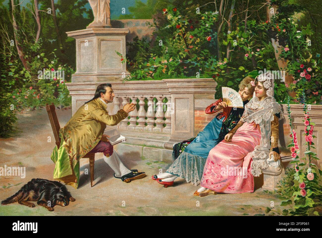 Un homme baiser et lire un livre à deux femmes vêtues de costumes traditionnels du XIXe siècle dans un jardin. Illustration de la lithographie de couleur de l'ancien XIXe siècle d'El Mundo Ilustrado 1879 Banque D'Images