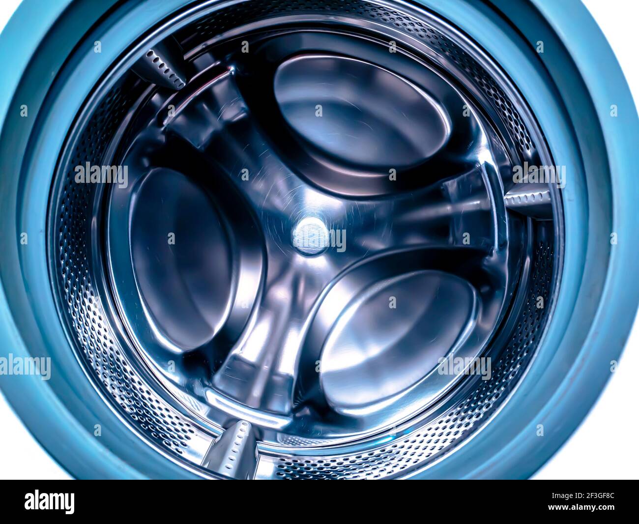 Tambour métallique de la machine à laver en acier inoxydable. Banque D'Images