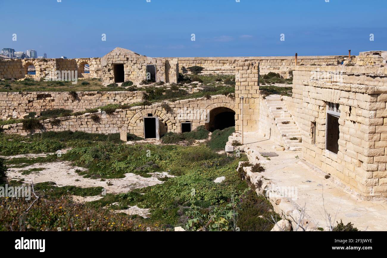Fragments de photos et ruines du fort Ricasoli qui a été construit par l'ordre de Saint Jean entre 1670 et 1698, situé à Kalkara, Malte. C'est la larg Banque D'Images