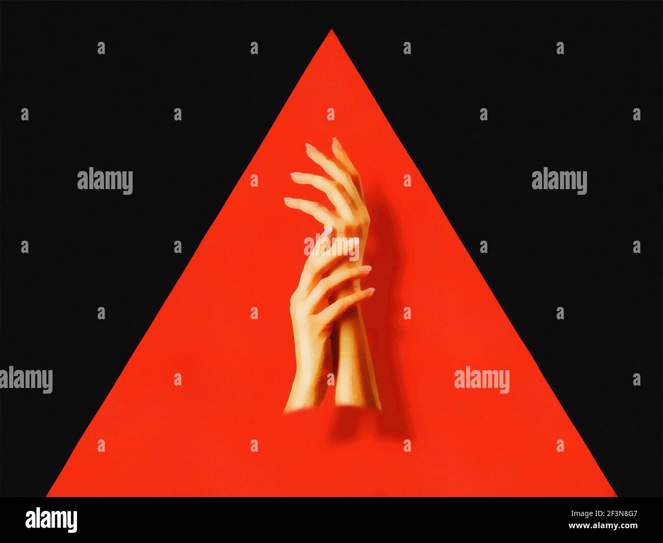 Les mains des femmes sur le fond du triangle. Noir et rouge. Travail artistique Banque D'Images