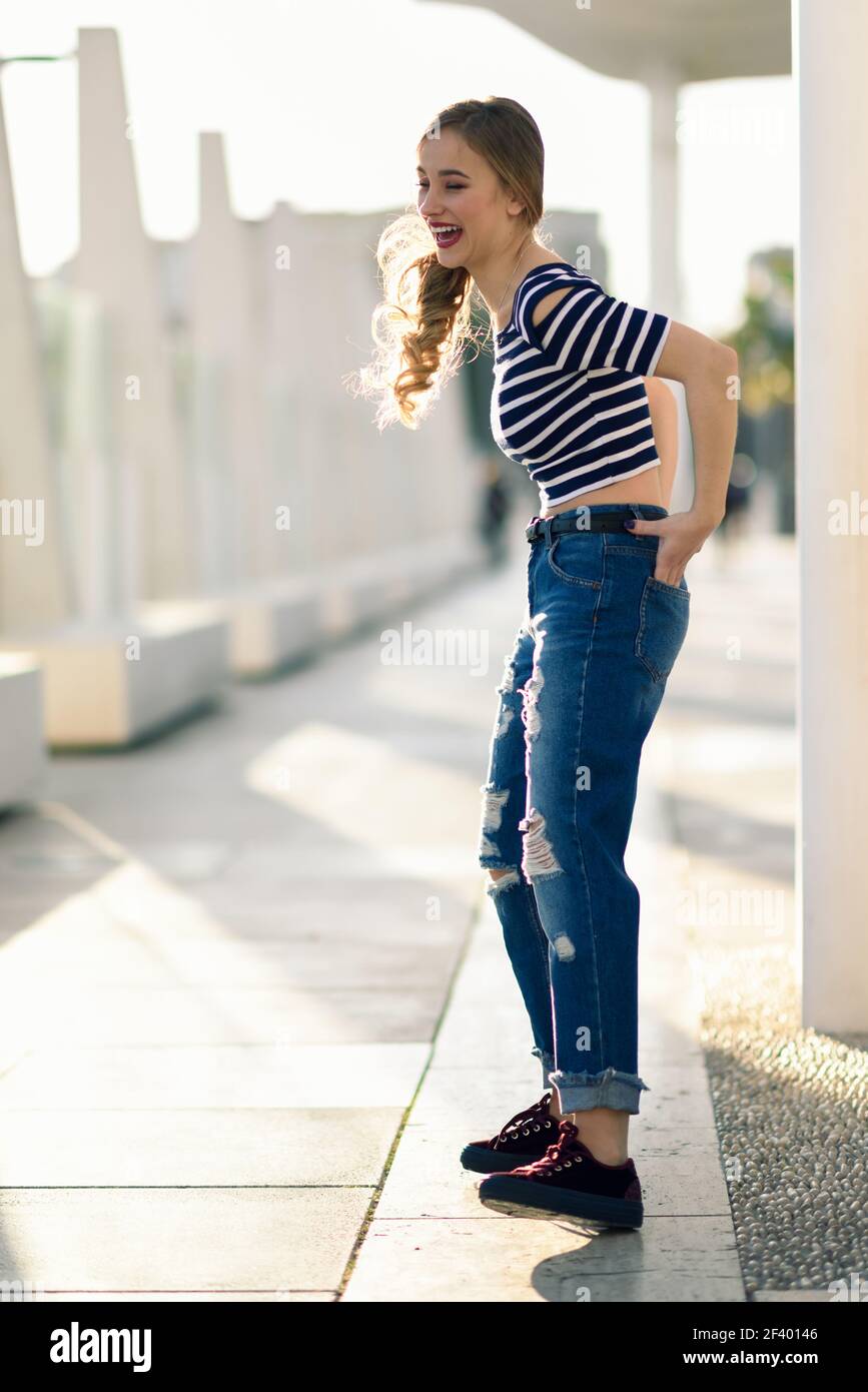 Girl wear cheap jeans and shirt