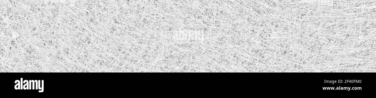 Fibre de verre ou filaments de fibre de verre feuille, arrière-plan de texture abstraite en format bannière. Photographie haute résolution. Banque D'Images